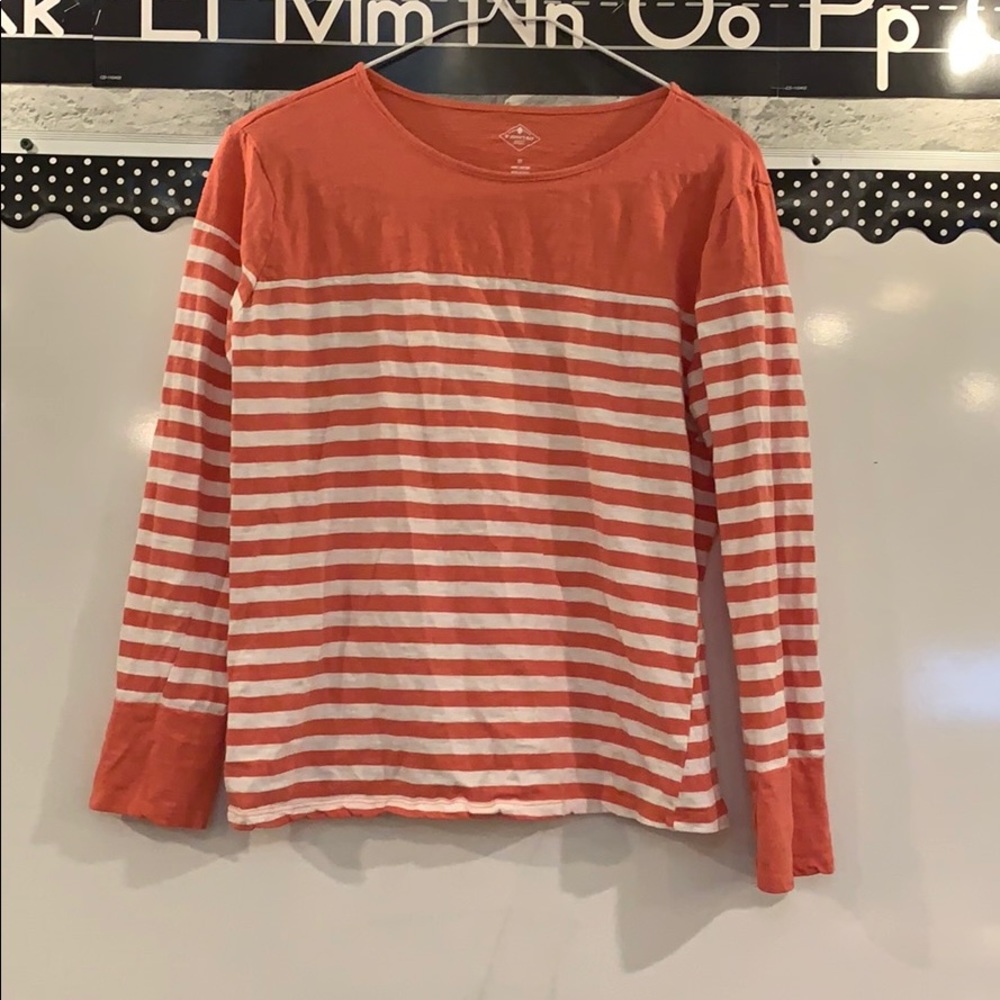 Coral and white striped shirt.